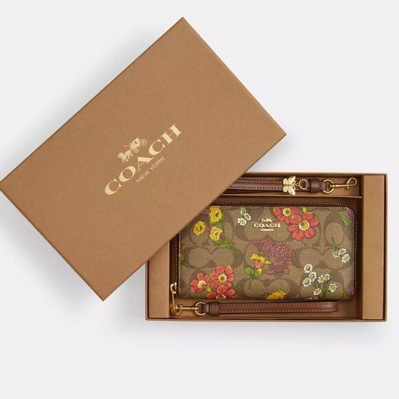 Coach Handbags - NWT Coach Boxed Long Zip Around Wallet In Signature Canvas With Floral Print